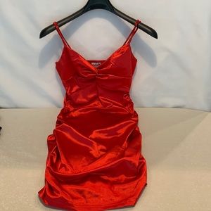 Madrag Red Satin cinched side and back. Size M